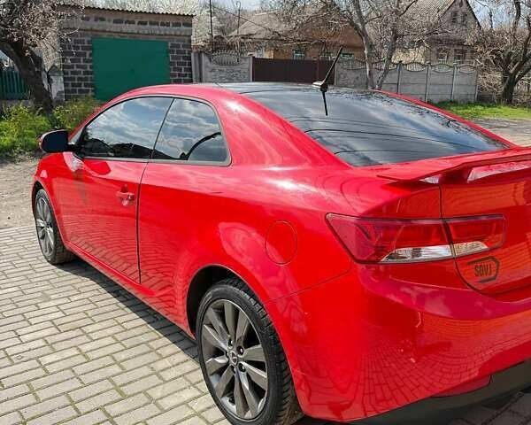 Червоний Кіа Cerato KOUP, об'ємом двигуна 2.4 л та пробігом 182 тис. км за 8500 $, фото 1 на Automoto.ua