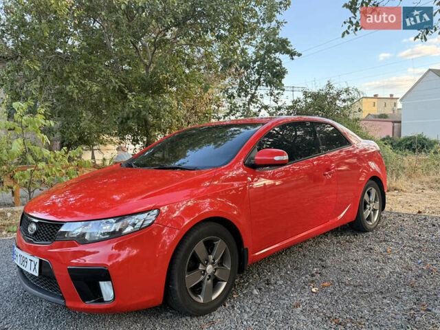 Красный Киа Cerato KOUP, объемом двигателя 1.6 л и пробегом 167 тыс. км за 7000 $, фото 6 на Automoto.ua