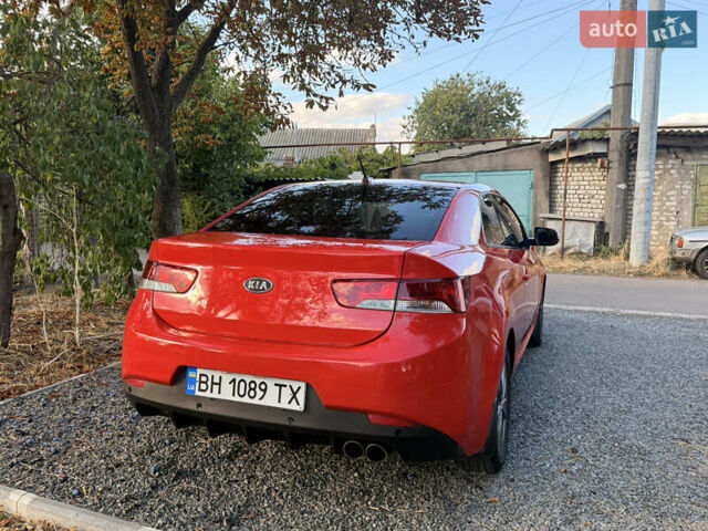 Красный Киа Cerato KOUP, объемом двигателя 1.6 л и пробегом 167 тыс. км за 7000 $, фото 3 на Automoto.ua