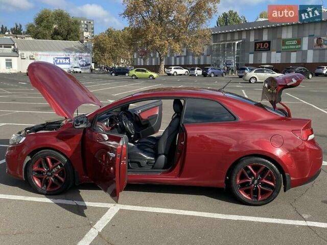 Красный Киа Cerato KOUP, объемом двигателя 2 л и пробегом 107 тыс. км за 10200 $, фото 11 на Automoto.ua