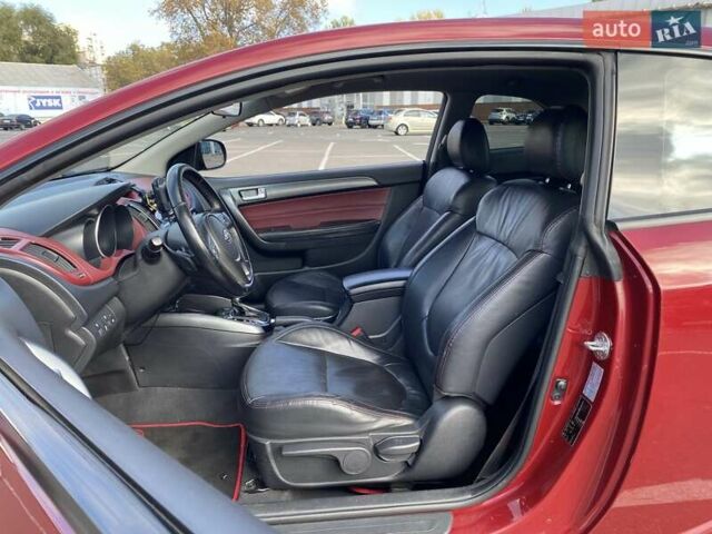 Красный Киа Cerato KOUP, объемом двигателя 2 л и пробегом 107 тыс. км за 10200 $, фото 16 на Automoto.ua