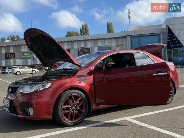 Красный Киа Cerato KOUP, объемом двигателя 2 л и пробегом 107 тыс. км за 10200 $, фото 12 на Automoto.ua
