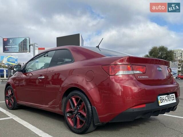 Красный Киа Cerato KOUP, объемом двигателя 2 л и пробегом 107 тыс. км за 10200 $, фото 9 на Automoto.ua