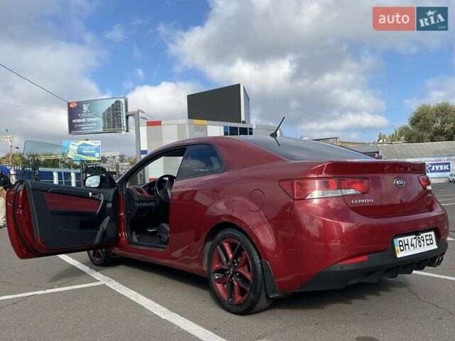 Красный Киа Cerato KOUP, объемом двигателя 2 л и пробегом 107 тыс. км за 10200 $, фото 10 на Automoto.ua