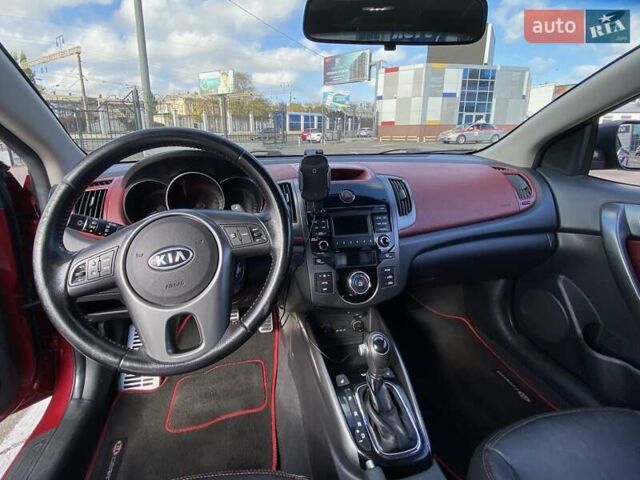 Красный Киа Cerato KOUP, объемом двигателя 2 л и пробегом 107 тыс. км за 10200 $, фото 18 на Automoto.ua
