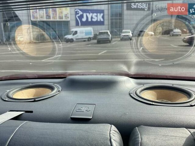 Красный Киа Cerato KOUP, объемом двигателя 2 л и пробегом 107 тыс. км за 10200 $, фото 15 на Automoto.ua