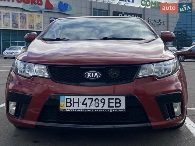 Красный Киа Cerato KOUP, объемом двигателя 2 л и пробегом 107 тыс. км за 10200 $, фото 2 на Automoto.ua