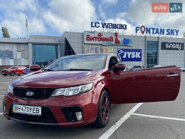 Красный Киа Cerato KOUP, объемом двигателя 2 л и пробегом 107 тыс. км за 10200 $, фото 1 на Automoto.ua