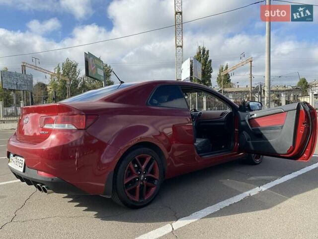 Красный Киа Cerato KOUP, объемом двигателя 2 л и пробегом 107 тыс. км за 10200 $, фото 8 на Automoto.ua