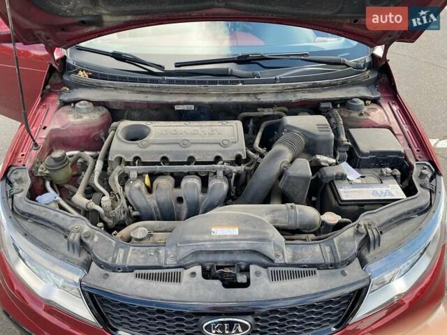 Красный Киа Cerato KOUP, объемом двигателя 2 л и пробегом 107 тыс. км за 10200 $, фото 13 на Automoto.ua
