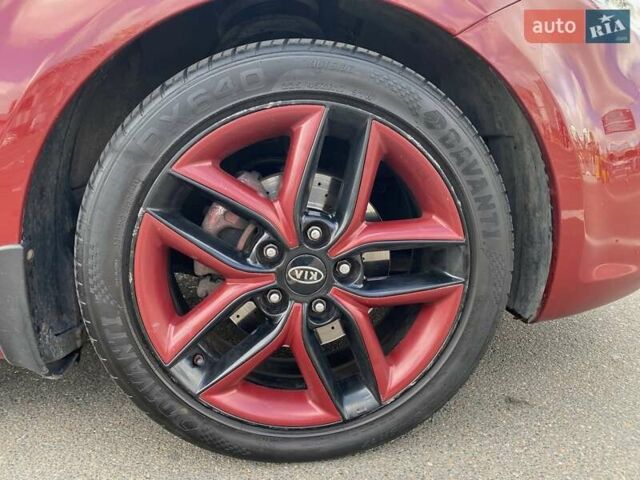 Красный Киа Cerato KOUP, объемом двигателя 2 л и пробегом 107 тыс. км за 10200 $, фото 28 на Automoto.ua