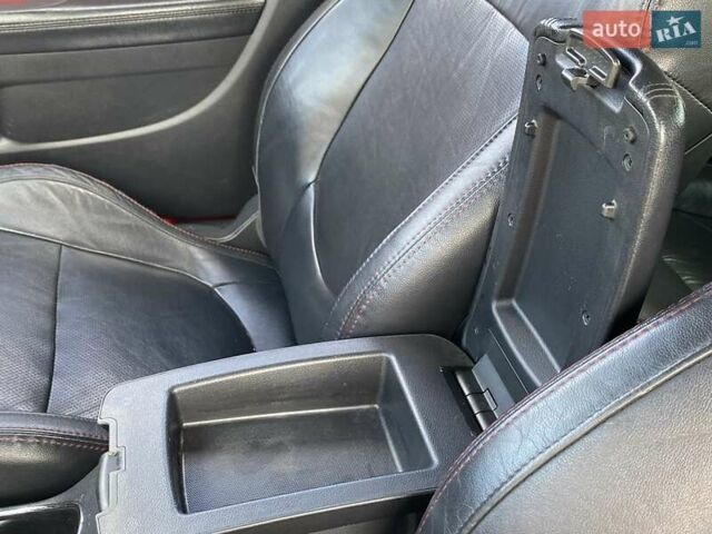 Красный Киа Cerato KOUP, объемом двигателя 2 л и пробегом 107 тыс. км за 10200 $, фото 25 на Automoto.ua