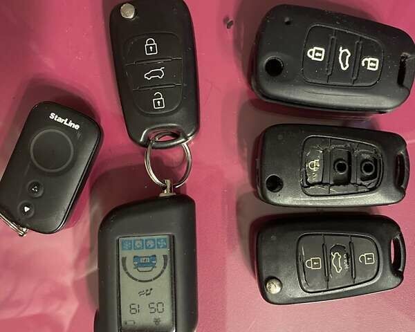 Красный Киа Cerato KOUP, объемом двигателя 2 л и пробегом 107 тыс. км за 10200 $, фото 29 на Automoto.ua