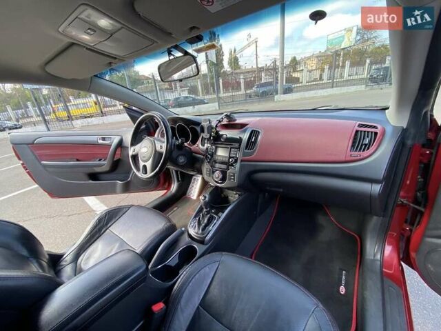 Красный Киа Cerato KOUP, объемом двигателя 2 л и пробегом 107 тыс. км за 10200 $, фото 19 на Automoto.ua
