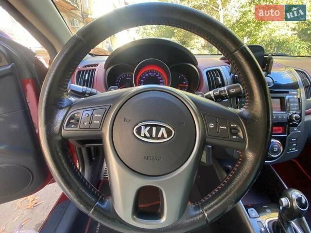 Красный Киа Cerato KOUP, объемом двигателя 2 л и пробегом 107 тыс. км за 10200 $, фото 40 на Automoto.ua