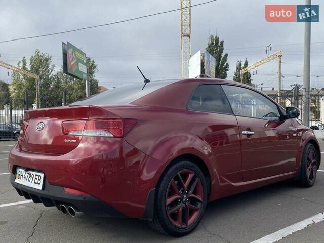 Красный Киа Cerato KOUP, объемом двигателя 2 л и пробегом 107 тыс. км за 10200 $, фото 7 на Automoto.ua