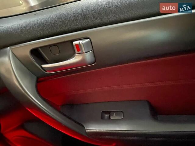 Красный Киа Cerato KOUP, объемом двигателя 2 л и пробегом 107 тыс. км за 10200 $, фото 21 на Automoto.ua