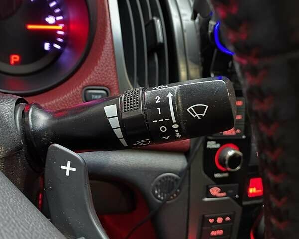 Красный Киа Cerato KOUP, объемом двигателя 2 л и пробегом 107 тыс. км за 10200 $, фото 46 на Automoto.ua