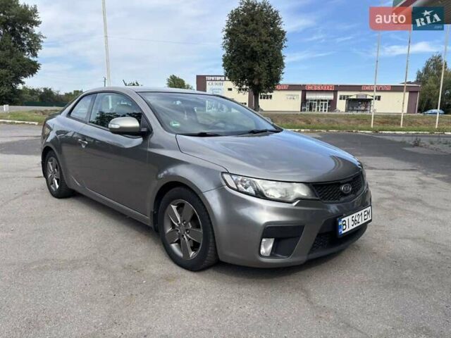 Серый Киа Cerato KOUP, объемом двигателя 1.6 л и пробегом 220 тыс. км за 6500 $, фото 3 на Automoto.ua