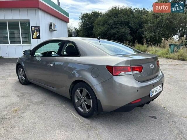 Серый Киа Cerato KOUP, объемом двигателя 1.6 л и пробегом 220 тыс. км за 6500 $, фото 4 на Automoto.ua