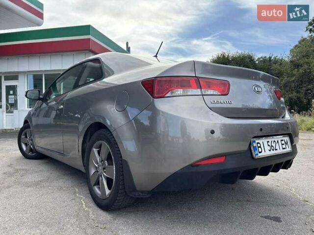Серый Киа Cerato KOUP, объемом двигателя 1.6 л и пробегом 220 тыс. км за 6500 $, фото 11 на Automoto.ua
