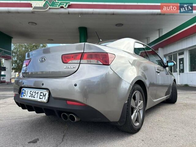 Серый Киа Cerato KOUP, объемом двигателя 1.6 л и пробегом 220 тыс. км за 6500 $, фото 6 на Automoto.ua