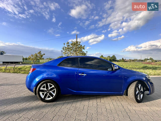 Синий Киа Cerato KOUP, объемом двигателя 2 л и пробегом 144 тыс. км за 8350 $, фото 4 на Automoto.ua