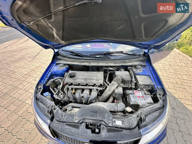 Синий Киа Cerato KOUP, объемом двигателя 2 л и пробегом 144 тыс. км за 8350 $, фото 30 на Automoto.ua