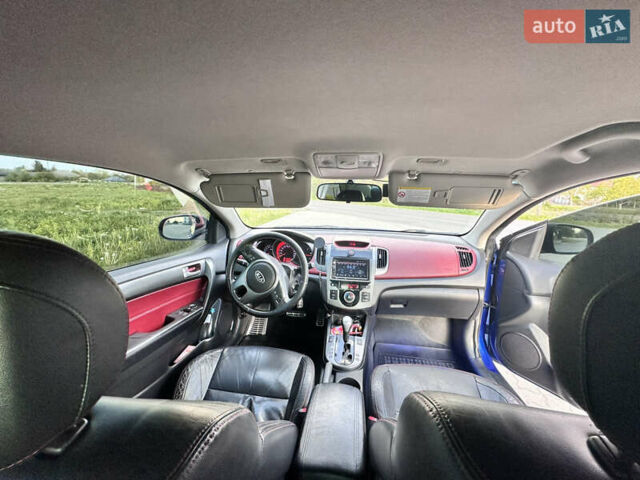 Синий Киа Cerato KOUP, объемом двигателя 2 л и пробегом 144 тыс. км за 8350 $, фото 36 на Automoto.ua