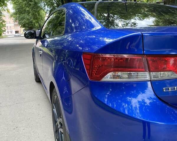 Синий Киа Cerato KOUP, объемом двигателя 2 л и пробегом 160 тыс. км за 8500 $, фото 4 на Automoto.ua