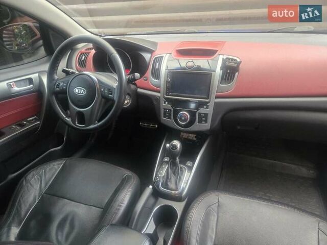 Синій Кіа Cerato KOUP, об'ємом двигуна 2 л та пробігом 158 тис. км за 8500 $, фото 5 на Automoto.ua