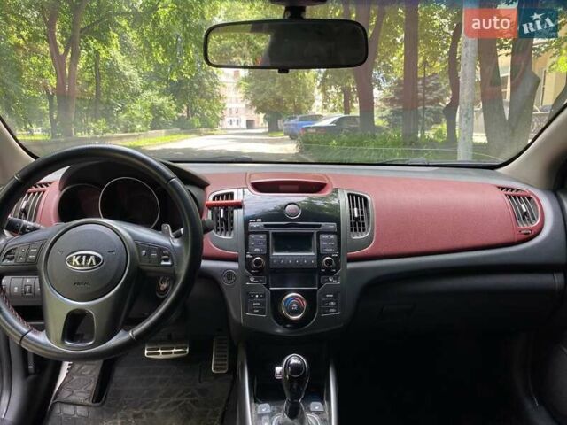 Синий Киа Cerato KOUP, объемом двигателя 2 л и пробегом 160 тыс. км за 8500 $, фото 7 на Automoto.ua