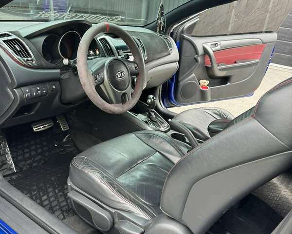 Синій Кіа Cerato KOUP, об'ємом двигуна 2 л та пробігом 236 тис. км за 9500 $, фото 13 на Automoto.ua