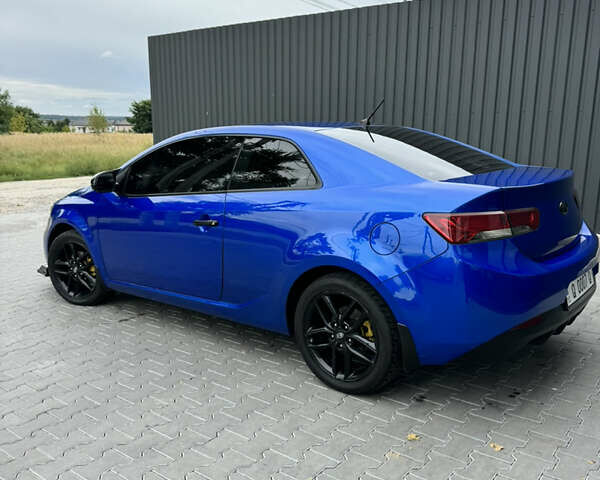 Синій Кіа Cerato KOUP, об'ємом двигуна 2 л та пробігом 236 тис. км за 9500 $, фото 6 на Automoto.ua