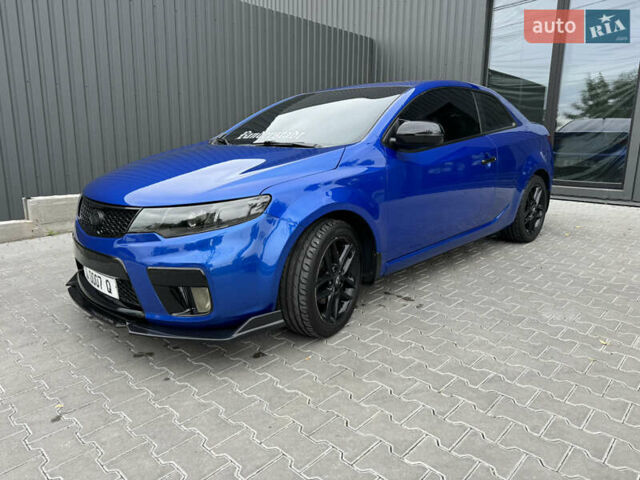 Синій Кіа Cerato KOUP, об'ємом двигуна 2 л та пробігом 236 тис. км за 9500 $, фото 4 на Automoto.ua