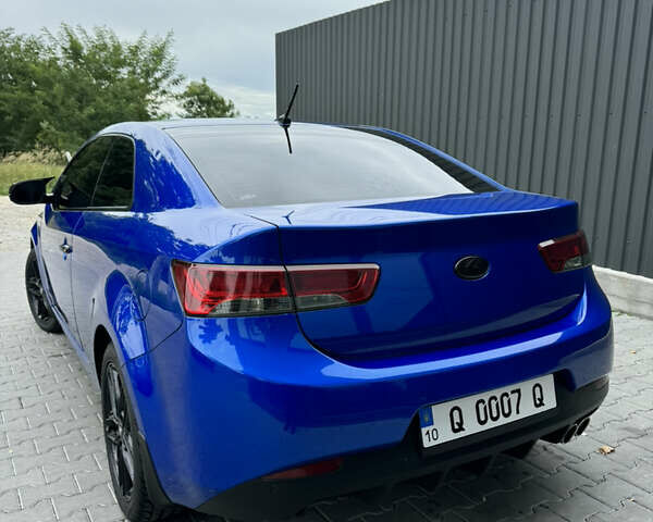 Синій Кіа Cerato KOUP, об'ємом двигуна 2 л та пробігом 236 тис. км за 9500 $, фото 5 на Automoto.ua