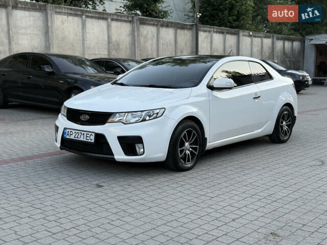 Білий Кіа Черато, об'ємом двигуна 2 л та пробігом 165 тис. км за 8200 $, фото 2 на Automoto.ua