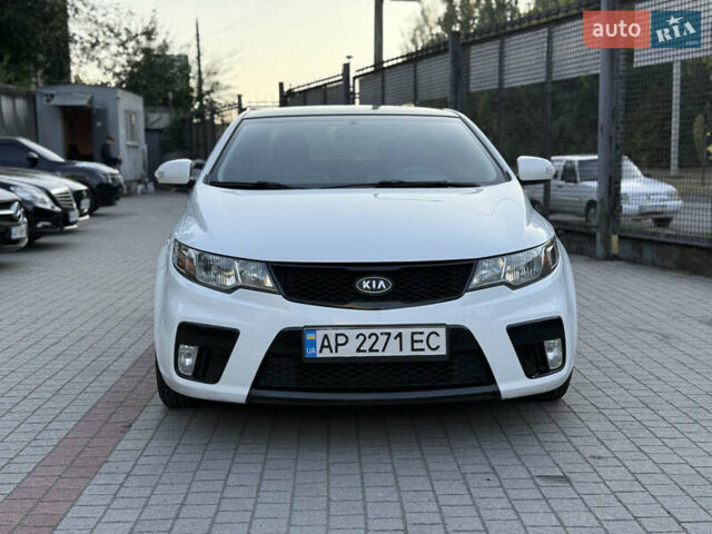 Білий Кіа Черато, об'ємом двигуна 2 л та пробігом 165 тис. км за 8200 $, фото 1 на Automoto.ua