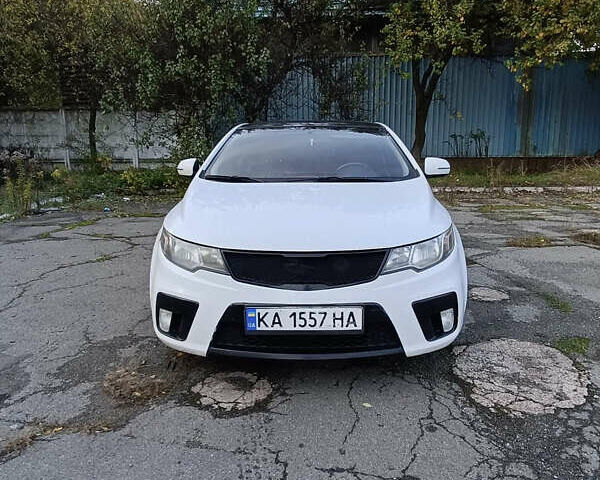 Белый Киа Черато, объемом двигателя 2 л и пробегом 144 тыс. км за 5499 $, фото 1 на Automoto.ua