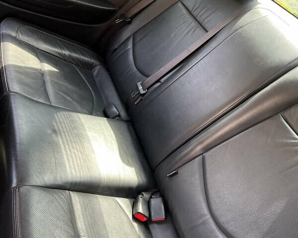 Білий Кіа Черато, об'ємом двигуна 2 л та пробігом 140 тис. км за 9200 $, фото 7 на Automoto.ua