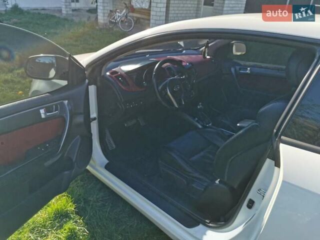 Белый Киа Черато, объемом двигателя 2 л и пробегом 139 тыс. км за 9800 $, фото 7 на Automoto.ua
