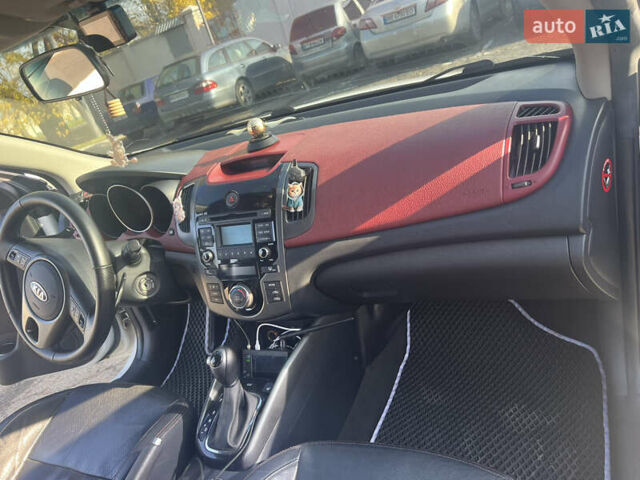 Белый Киа Черато, объемом двигателя 2 л и пробегом 213 тыс. км за 8600 $, фото 10 на Automoto.ua