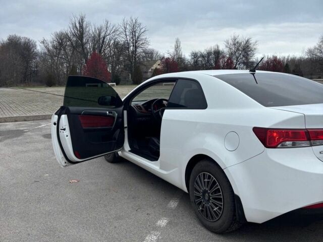 Білий Кіа Черато, об'ємом двигуна 2 л та пробігом 175 тис. км за 8500 $, фото 4 на Automoto.ua