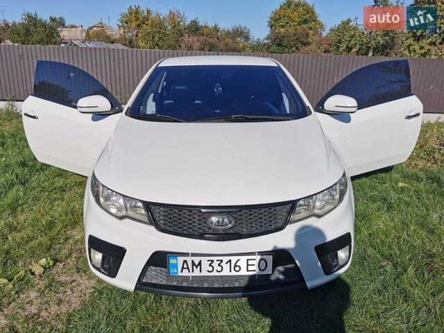 Белый Киа Черато, объемом двигателя 2 л и пробегом 139 тыс. км за 9800 $, фото 9 на Automoto.ua