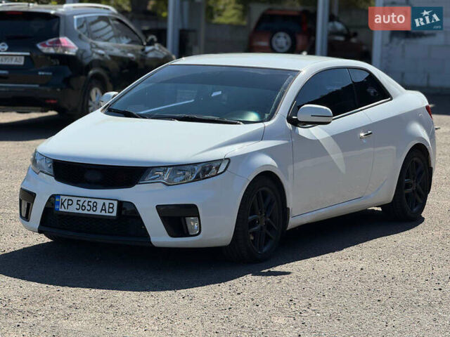 Белый Киа Черато, объемом двигателя 2 л и пробегом 220 тыс. км за 8200 $, фото 7 на Automoto.ua