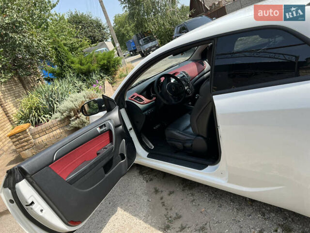 Білий Кіа Черато, об'ємом двигуна 2 л та пробігом 140 тис. км за 9200 $, фото 8 на Automoto.ua