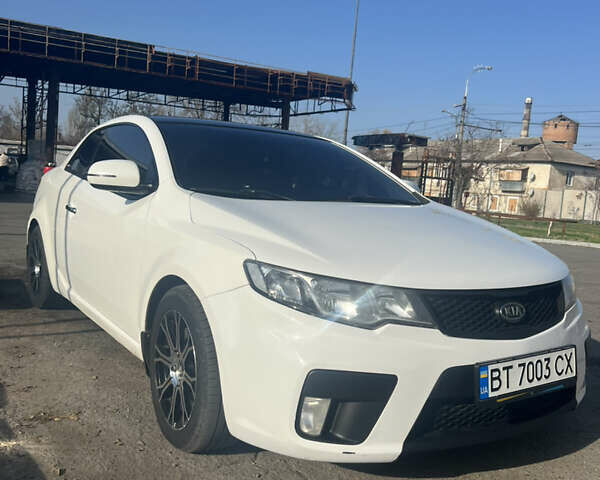 Белый Киа Черато, объемом двигателя 2 л и пробегом 213 тыс. км за 8600 $, фото 2 на Automoto.ua