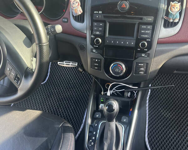 Белый Киа Черато, объемом двигателя 2 л и пробегом 213 тыс. км за 8600 $, фото 9 на Automoto.ua