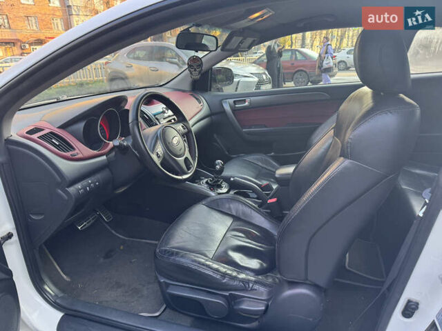 Белый Киа Черато, объемом двигателя 2 л и пробегом 195 тыс. км за 7800 $, фото 13 на Automoto.ua