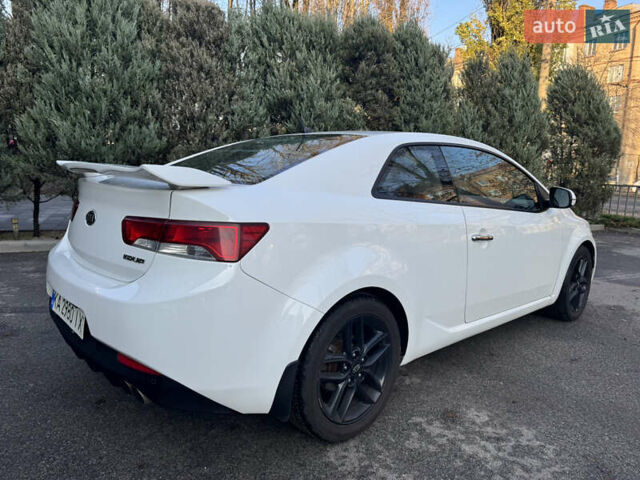Белый Киа Черато, объемом двигателя 2 л и пробегом 195 тыс. км за 7800 $, фото 6 на Automoto.ua